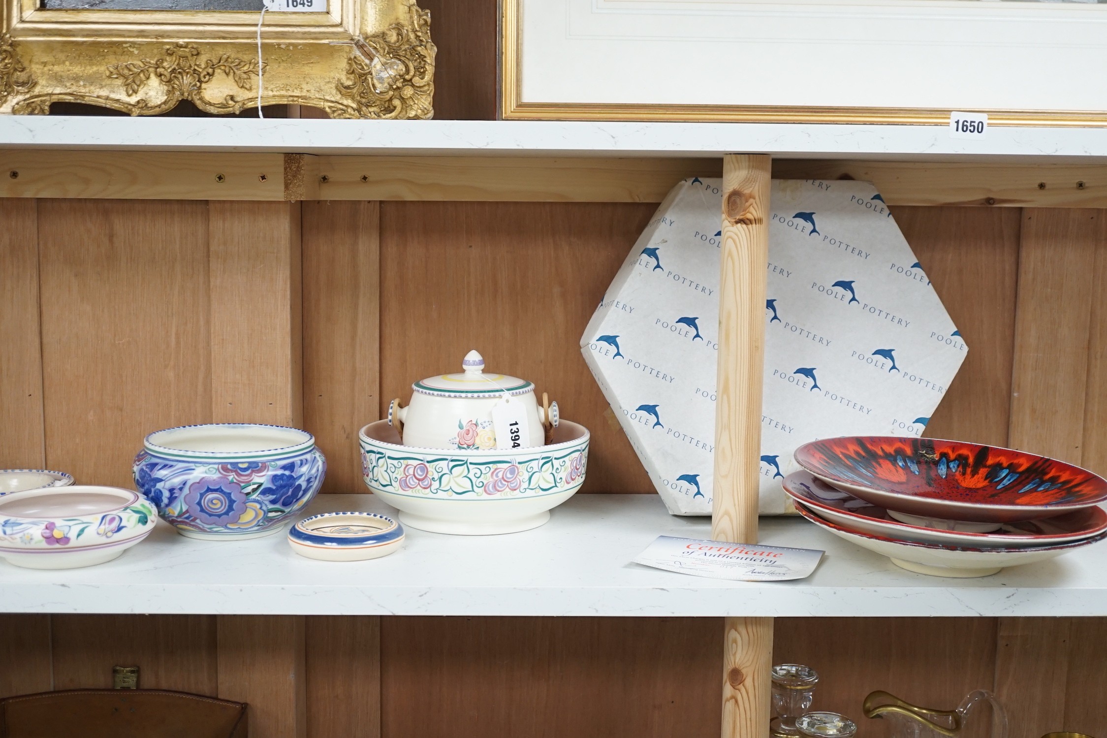 Five items of 1930's/40's Poole pottery, two Delphis plates and a boxed yellow poppy plate